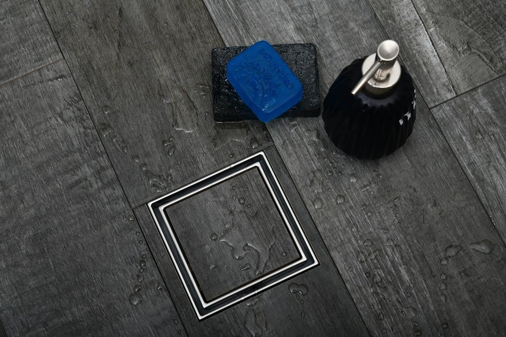 Desagüe de piso lateral universal 